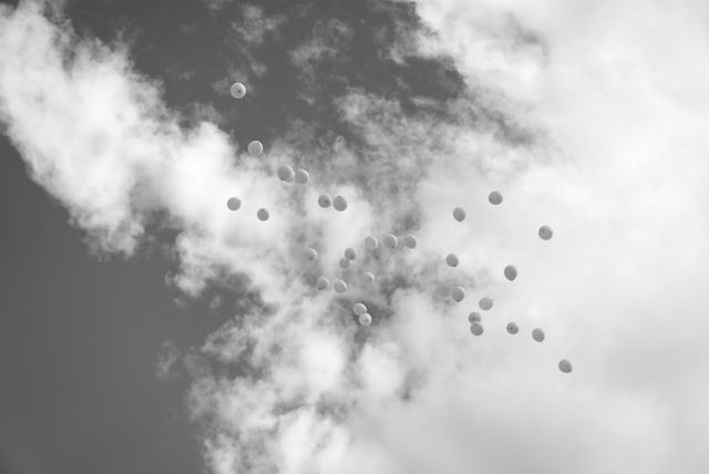 Balloon release honoring a loved one during a cremation memorial in Sterling Heights, MI